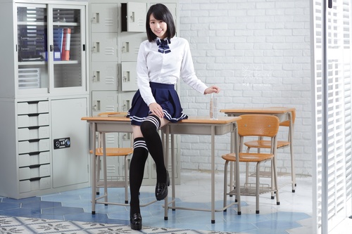 Lovely girls in school uniforms Stock Photo