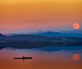 Reflection of the mountains on the water Stock Photo