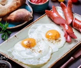 Sausage and fried egg Stock Photo