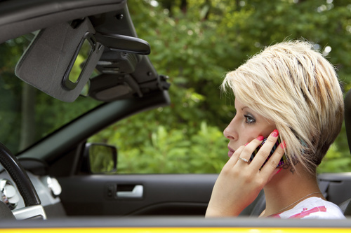 Short hair woman sitting in the car calling Stock Photo
