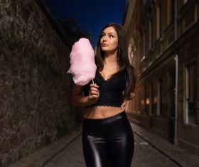 Stock Photo Woman holding candyfloss