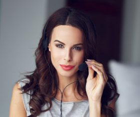 Stock Photo Woman wearing headset talking 01