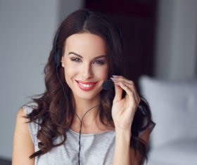 Stock Photo Woman wearing headset talking 02