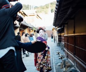 Street shooting geisha Stock Photo