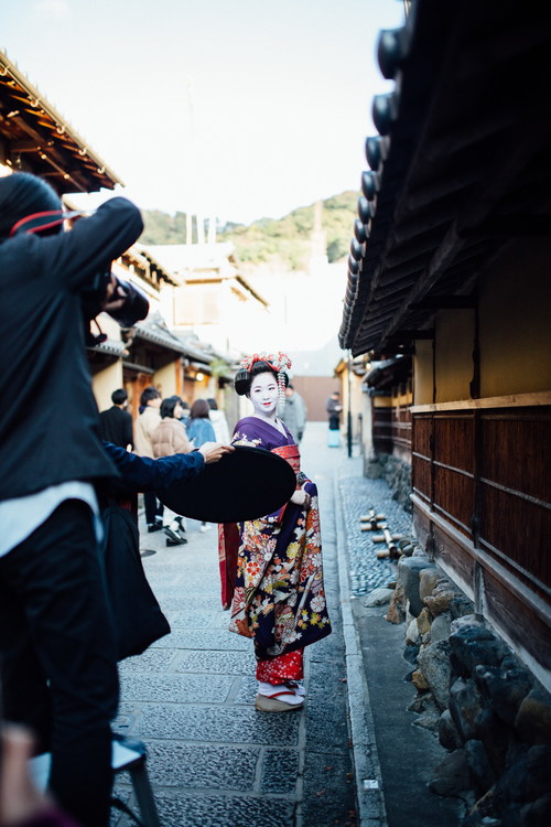 Street shooting geisha Stock Photo