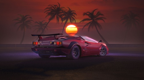 Sunset beach red sports car Stock Photo