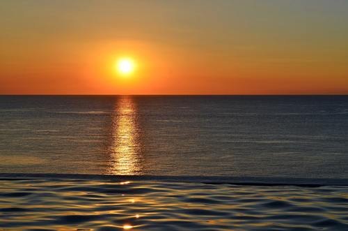 Waves of sea at dusk Stock Photo