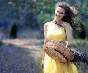 Woman holding a woven basket Stock Photo 01