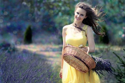 Woman holding a woven basket Stock Photo 01