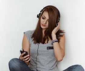 Woman listening to music Stock Photo 02