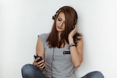 Woman listening to music Stock Photo 02