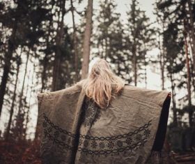 Woman wearing floral pattern coat Stock Photo