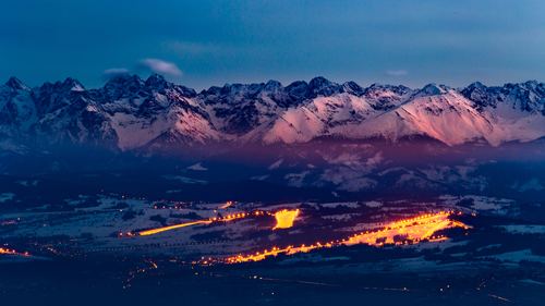 mountain ski resort dusk city lights
