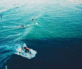 waves surfing surfers Stock Photo