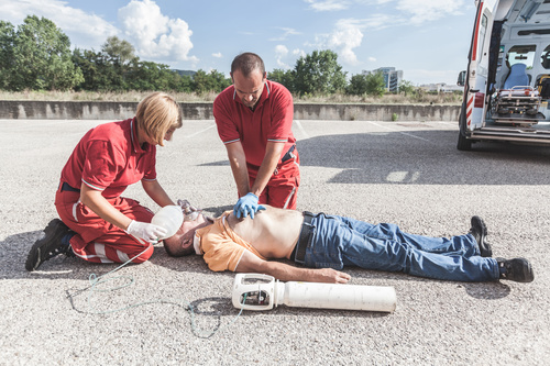 Ambulance staff give heart resuscitation to patients Stock Photo 02