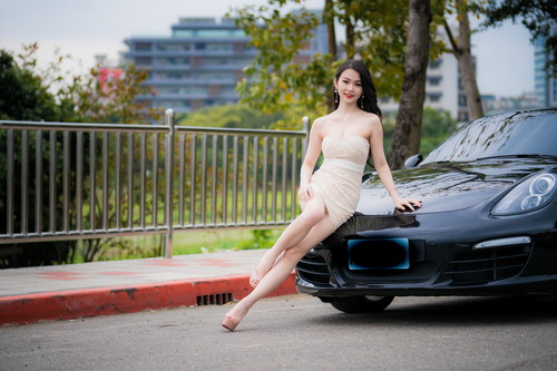 Beautiful woman with sports car Stock Photo