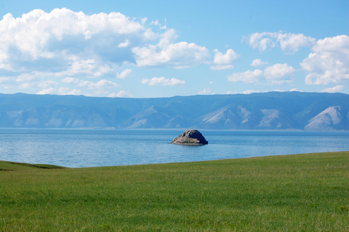 Blue lake with raised rocks Stock Photo