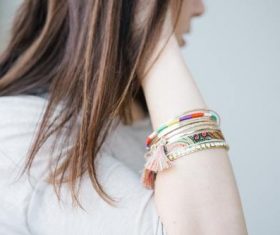Bracelet close-up on girl arm Stock Photo