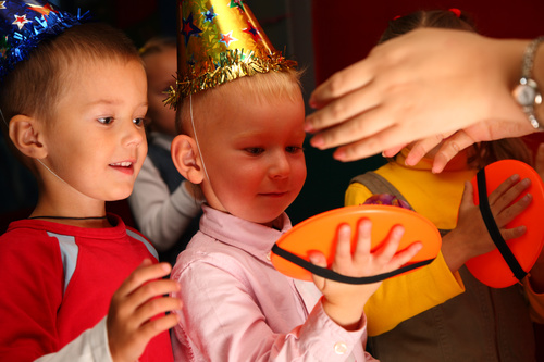 Child with birthday hat Stock Photo