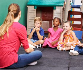 Children listen to the lectures of kindergarten teachers Stock Photo