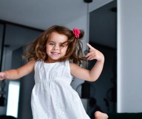 Dancing little girl Stock Photo