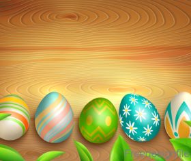 Easter egg with green leaves and wood background vector