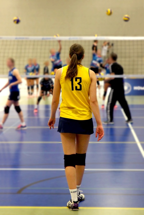 Female volleyball player back shadow Stock Photo