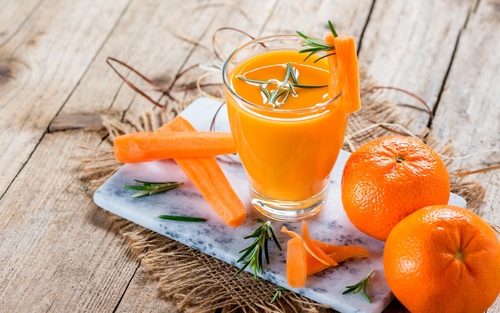 Freshly squeezed sweet orange juice and sweet orange Stock Photo