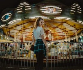 Girl in the amusement park Stock Photo