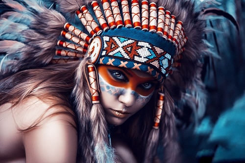 Girl soldier an Indian dress on head from feathers Stock Photo 08