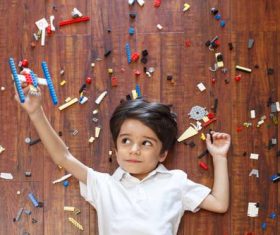 Little boy making toy plane Stock Photo 01