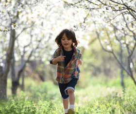 Little boy running Stock Photo