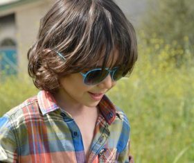 Little boy with sunglasses Stock Photo