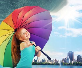 Little girl hold up an umbrella Stock Photo