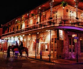 Mounted police on the street at night Stock Photo