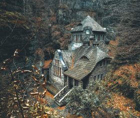 Stone house in the woods in the mountains Stock Photo