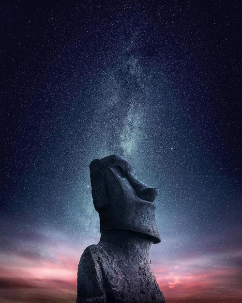 Stone statue and starry sky Stock Photo