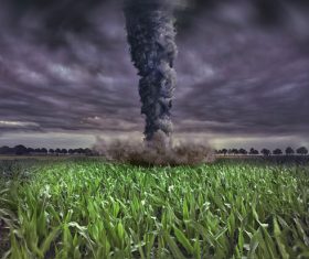 Tornado attacking farmland Stock Photo