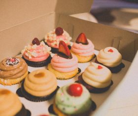 Various cupcakes in the box Stock Photo