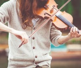 Violinist character close-up photography Stock Photo