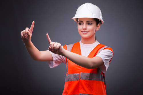 Wearing hard hat wearing overalls woman gesturing Stock Photo 08