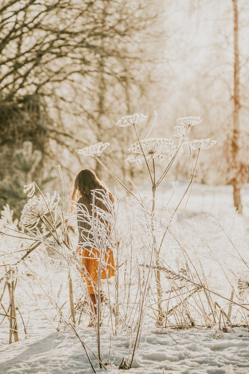 Winter wearing short skirt woman walking outdoors Stock Photo