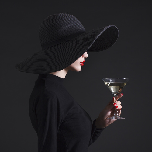 Woman holding a glass of champagne Stock Photo 04