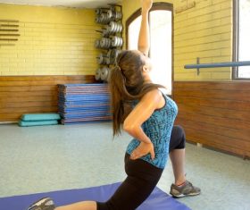 Woman practicing yoga indoors Stock Photo 05