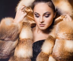 Woman wearing warm mink coat Stock Photo 01