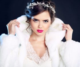 Woman wearing white mink coat Stock Photo