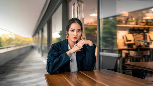 Women model asian sitting at the wooden table Stock Photo