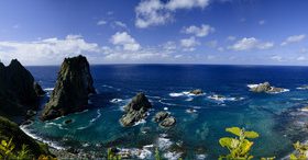 sky coast rock horizon seawater Stock Photo