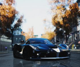 Black Ferrari LaFerrari race cars parked in the middle of the road Stock Photo