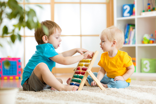 Children playing abacus Stock Photo